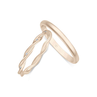 Trauringe mit gedrehtem Ring und zehn Brillanten in Ambridge Gold