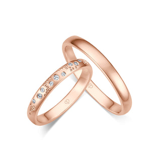 Trauringe mit neun Brillanten, punktiert in Roségold