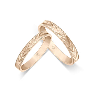 Trauringe mit symmetrischem Blütenmuster in Roségold