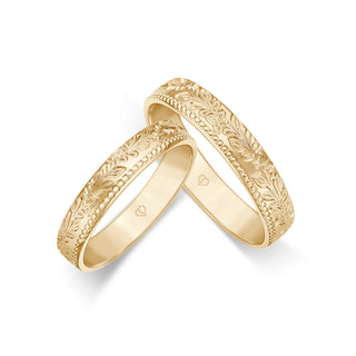 Trauringe mit rankendem Blumenmuster in Gelbgold