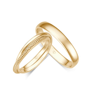 Trauringe mit Perlenstruktur in Gelbgold