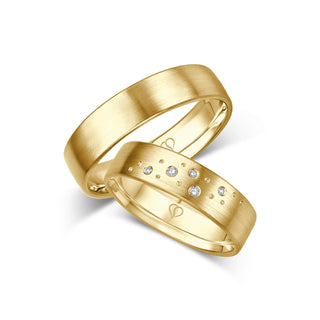 Trauringe Sternenbild mit verteilten Brillanten in Gelbgold